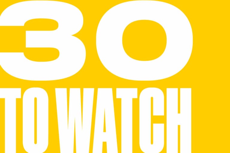 Bold white text on a bright yellow background reads 30 To Watch, celebrating the 2022 Young Journalist Awards. The top half of the image features the large number 30, while TO WATCH appears in tall letters at the bottom.